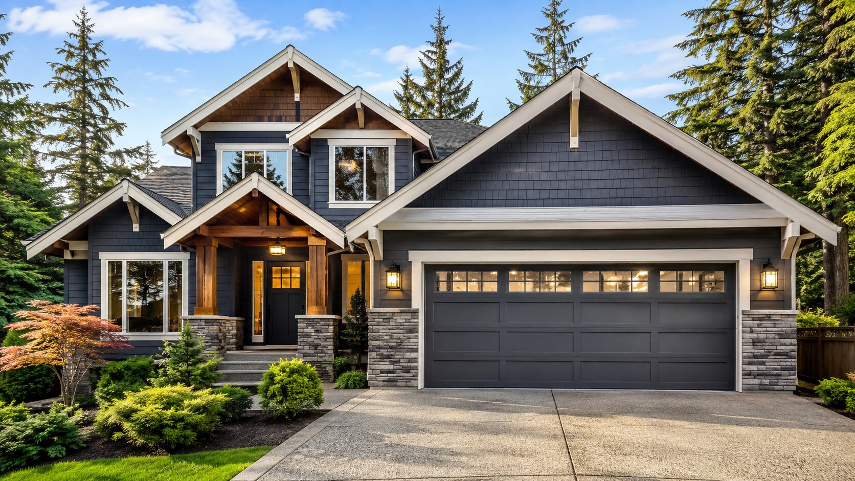 gray-raised-panel-sectional-garage-door-windows-two-car-craftsman